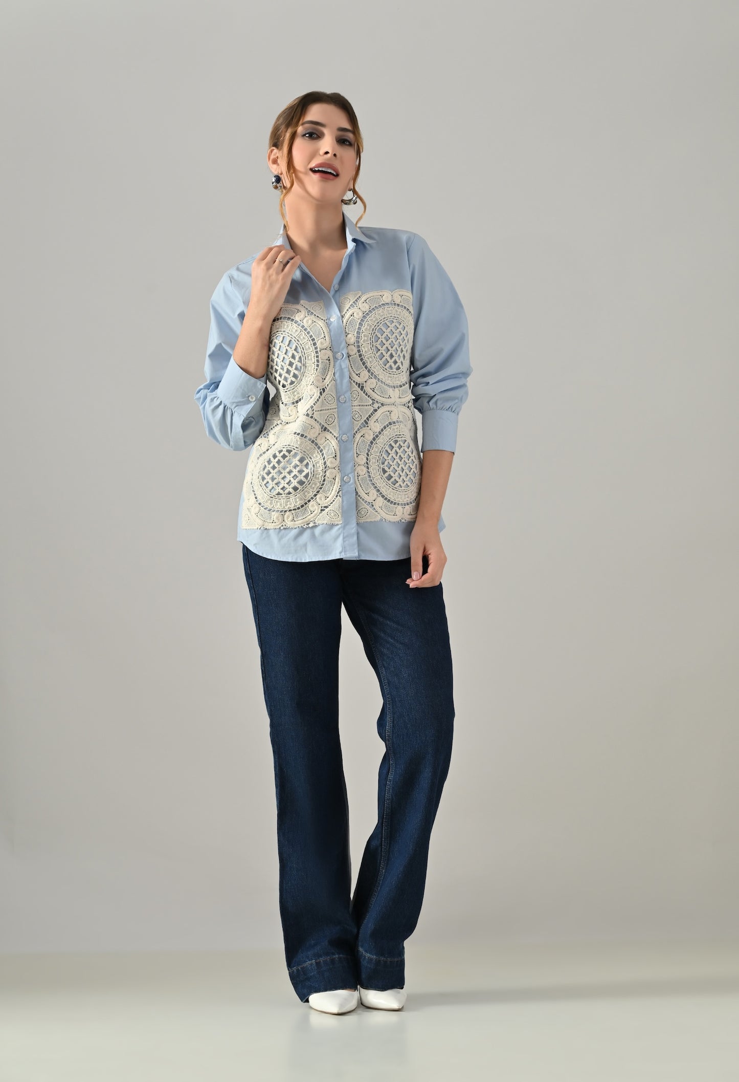 Blue shirt with white cutwork embroidery