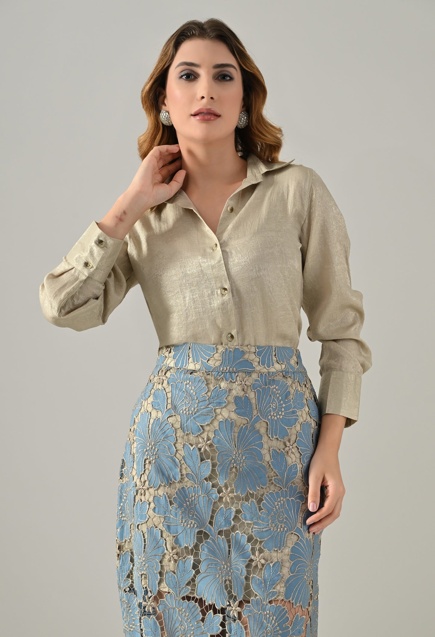 Golden shirt with blue lace skirt