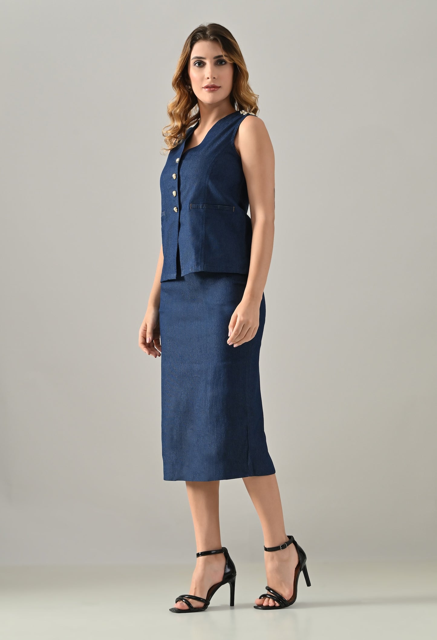 Blue denim waistcoat and skirt with golden buttons