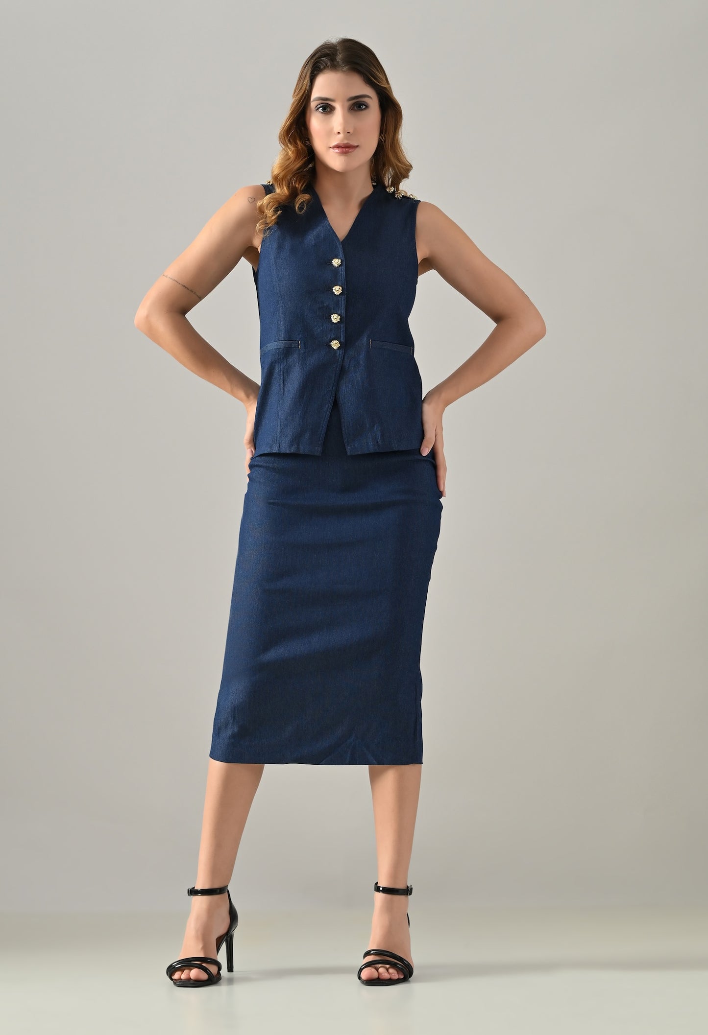 Blue denim waistcoat and skirt with golden buttons