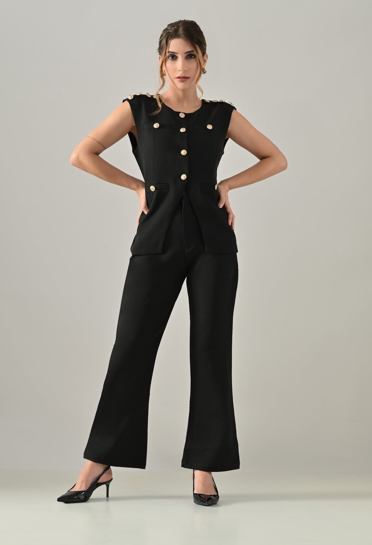 Black waistcoat with golden buttons and black flared pants