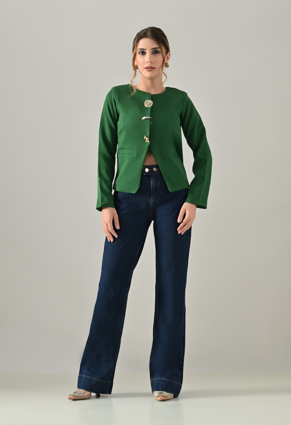 Green coat with bold golden buttons