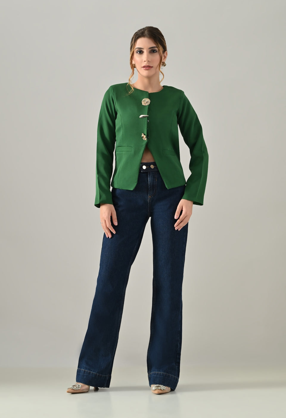 Green coat with bold golden buttons