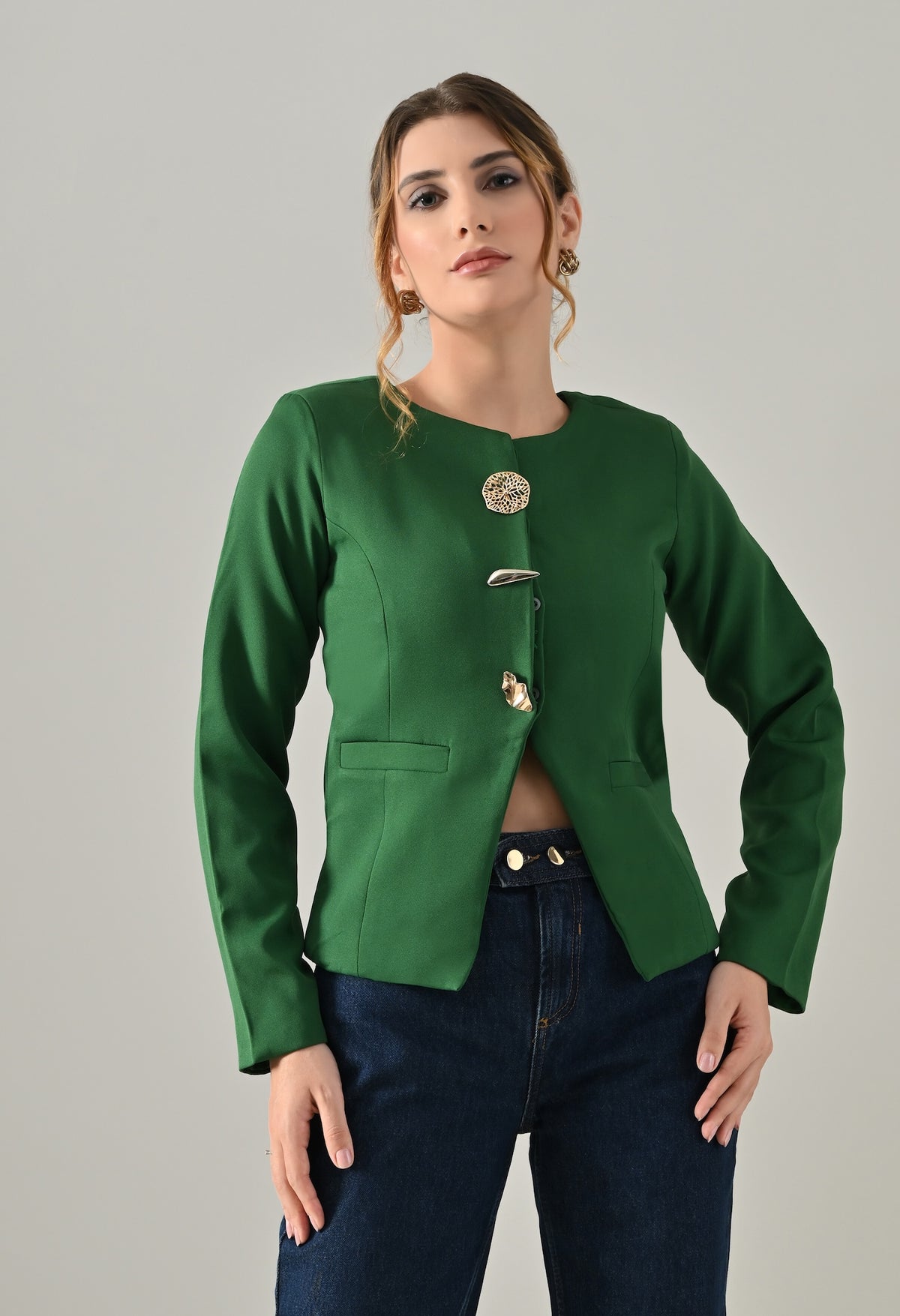 Green coat with bold golden buttons