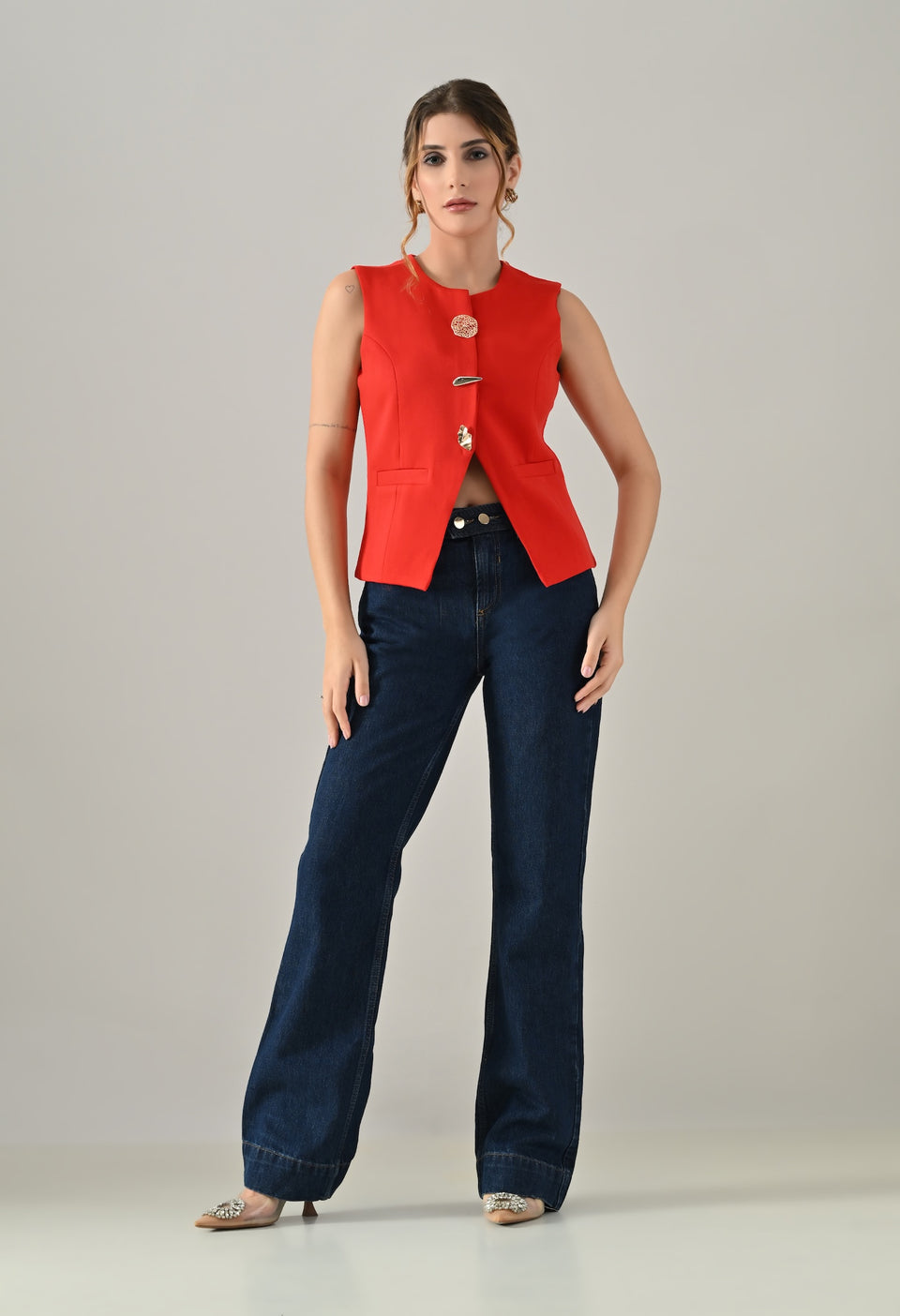 Red waistcoat with gold button detailing