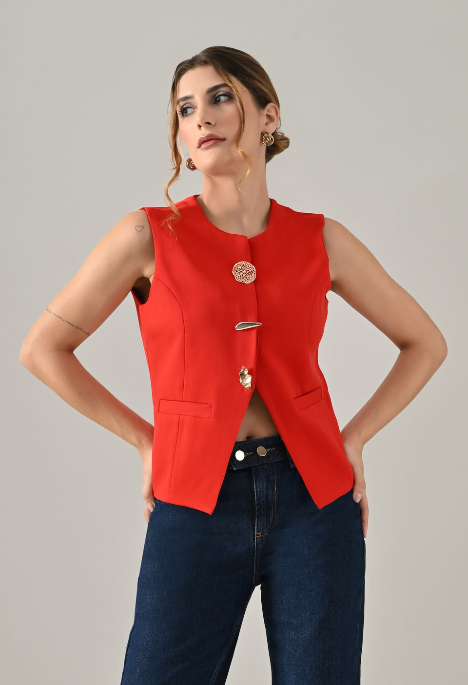 Red waistcoat with gold button detailing