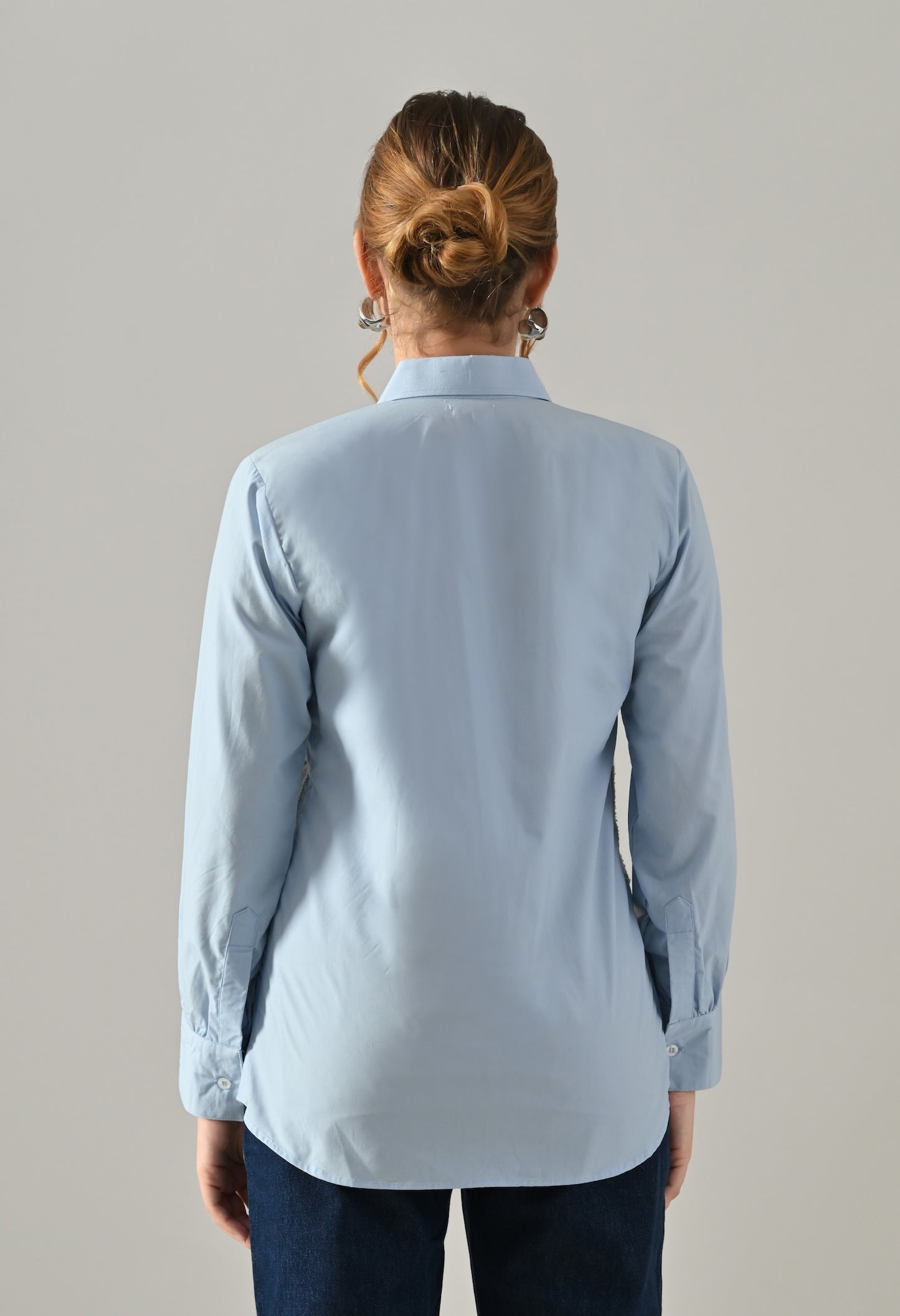 Blue shirt with white cutwork embroidery