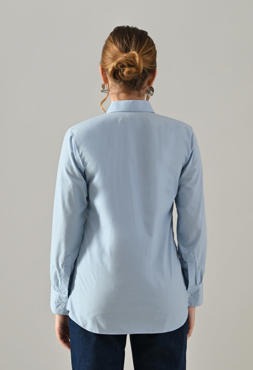 Blue shirt with white cutwork embroidery