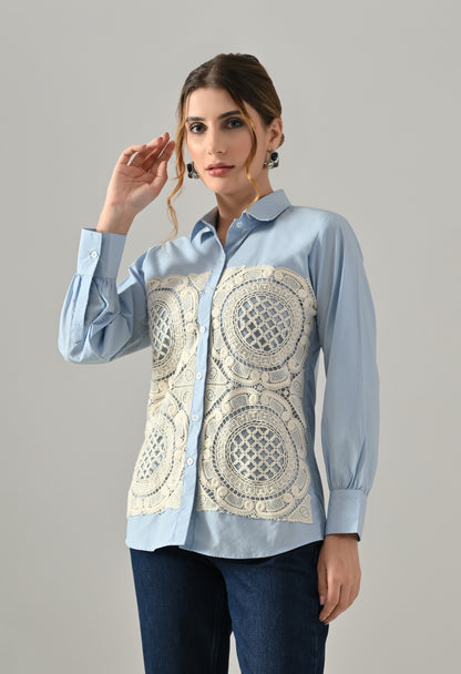 Blue shirt with white cutwork embroidery
