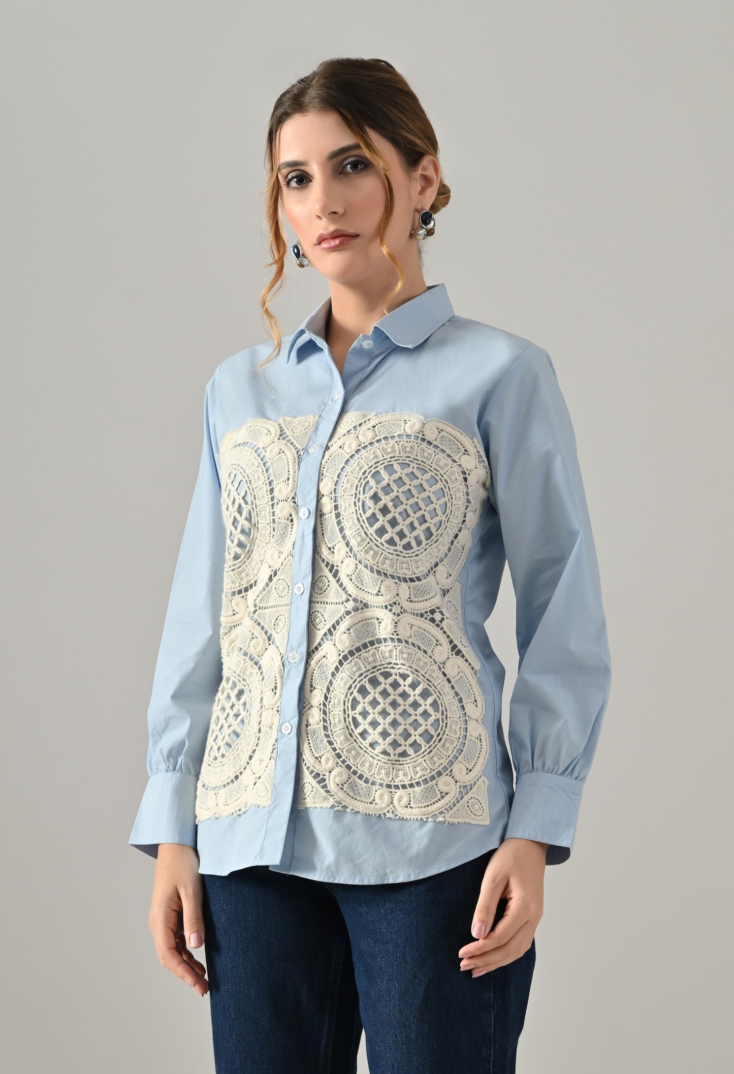 Blue shirt with white cutwork embroidery