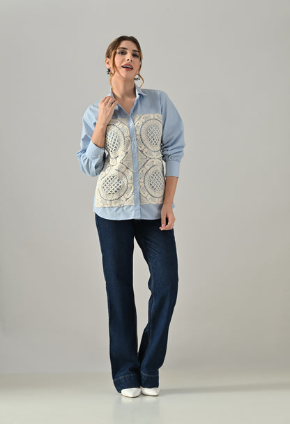Blue shirt with white cutwork embroidery