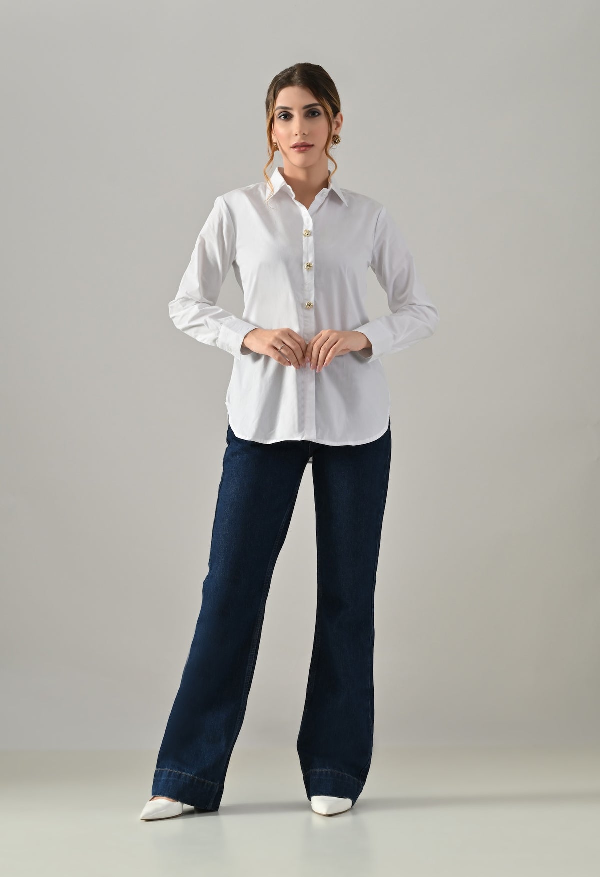 White shirt with golden buttons