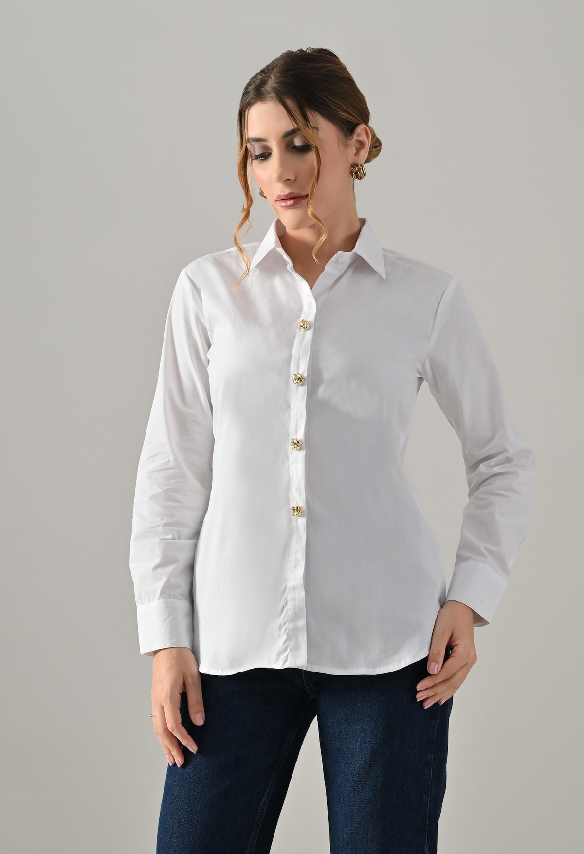 White shirt with golden buttons