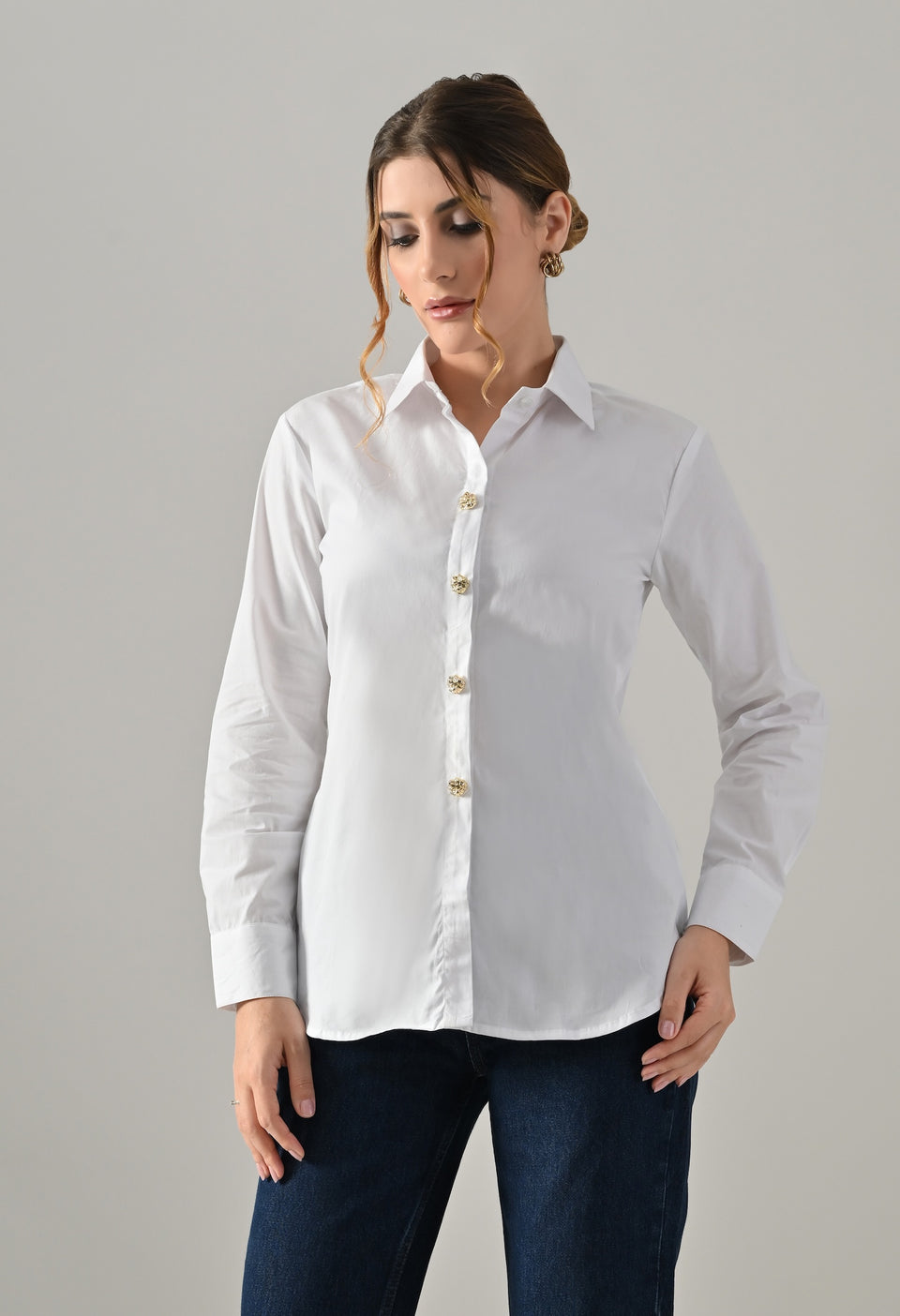 White shirt with golden buttons