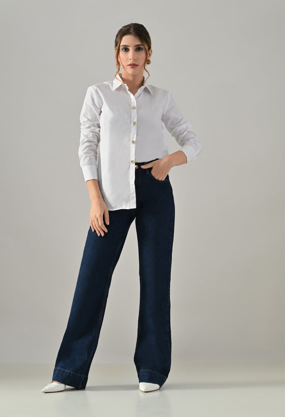 White shirt with golden buttons
