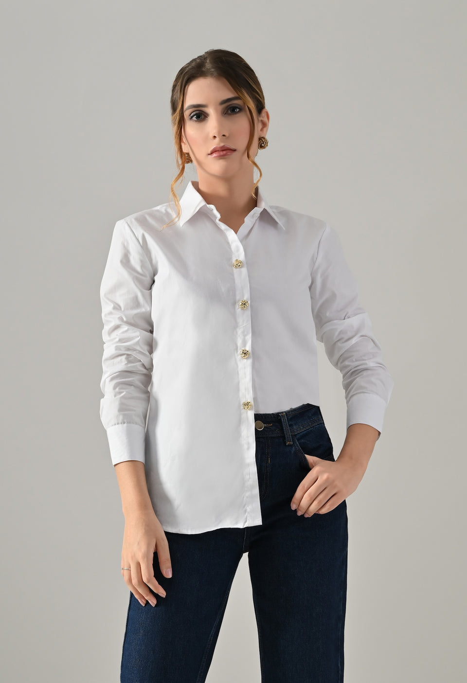 White shirt with golden buttons