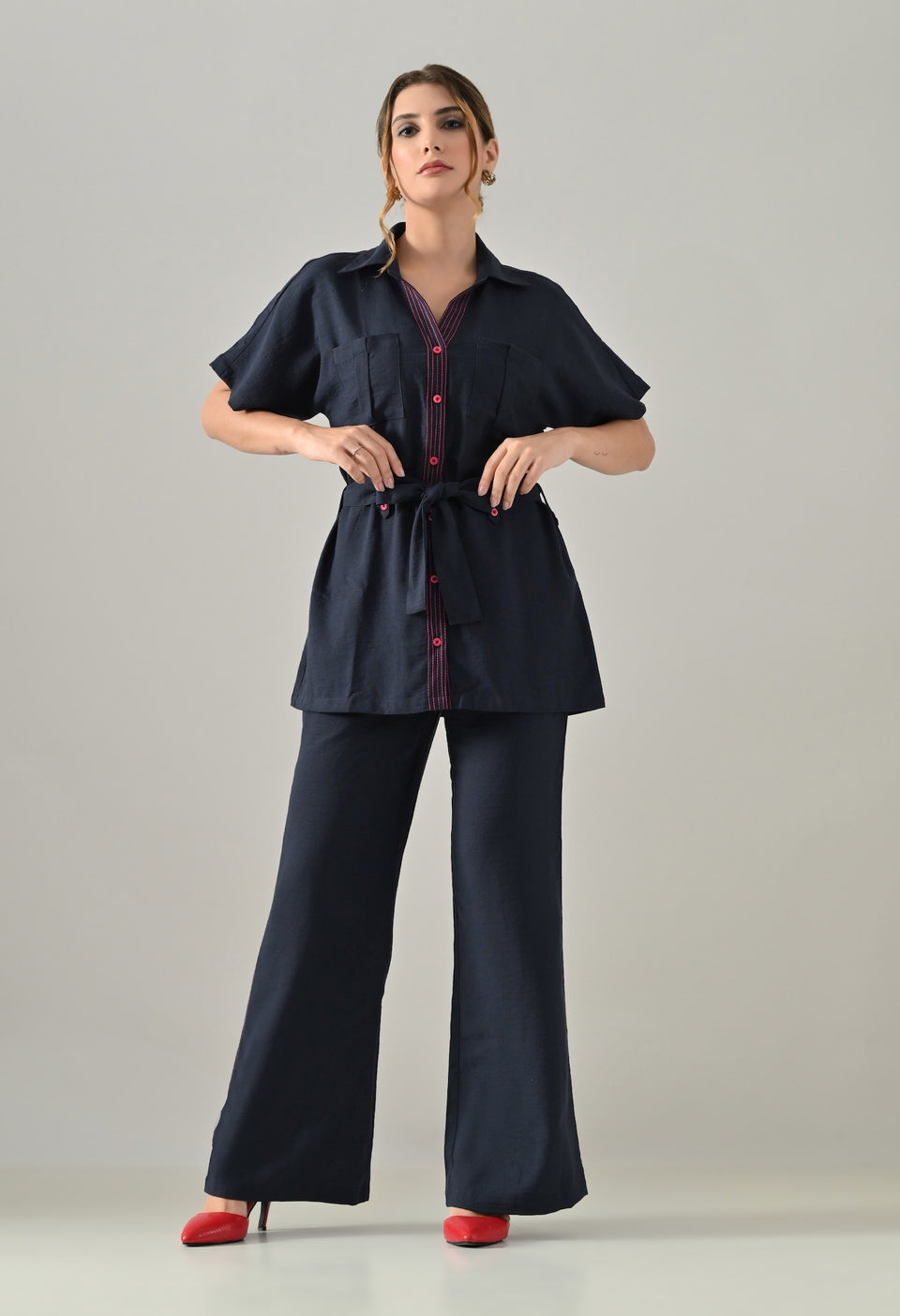 Blue Co-ord set with pink highlights, belt and flared trousers