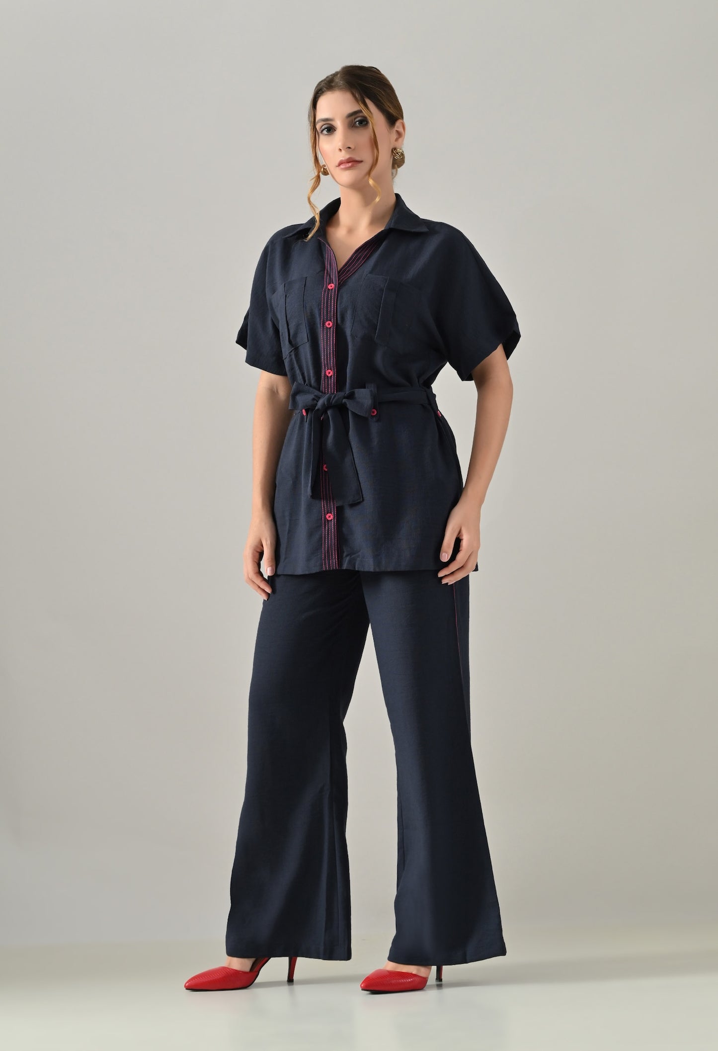 Blue Co-ord set with pink highlights, belt and flared trousers