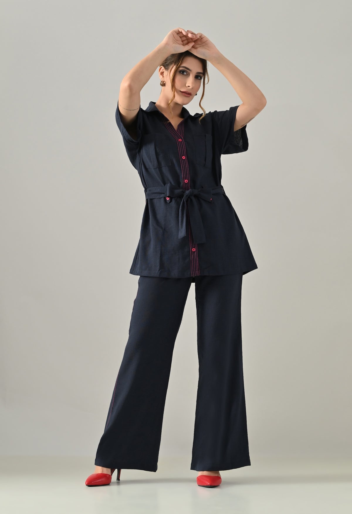 Blue Co-ord set with pink highlights, belt and flared trousers