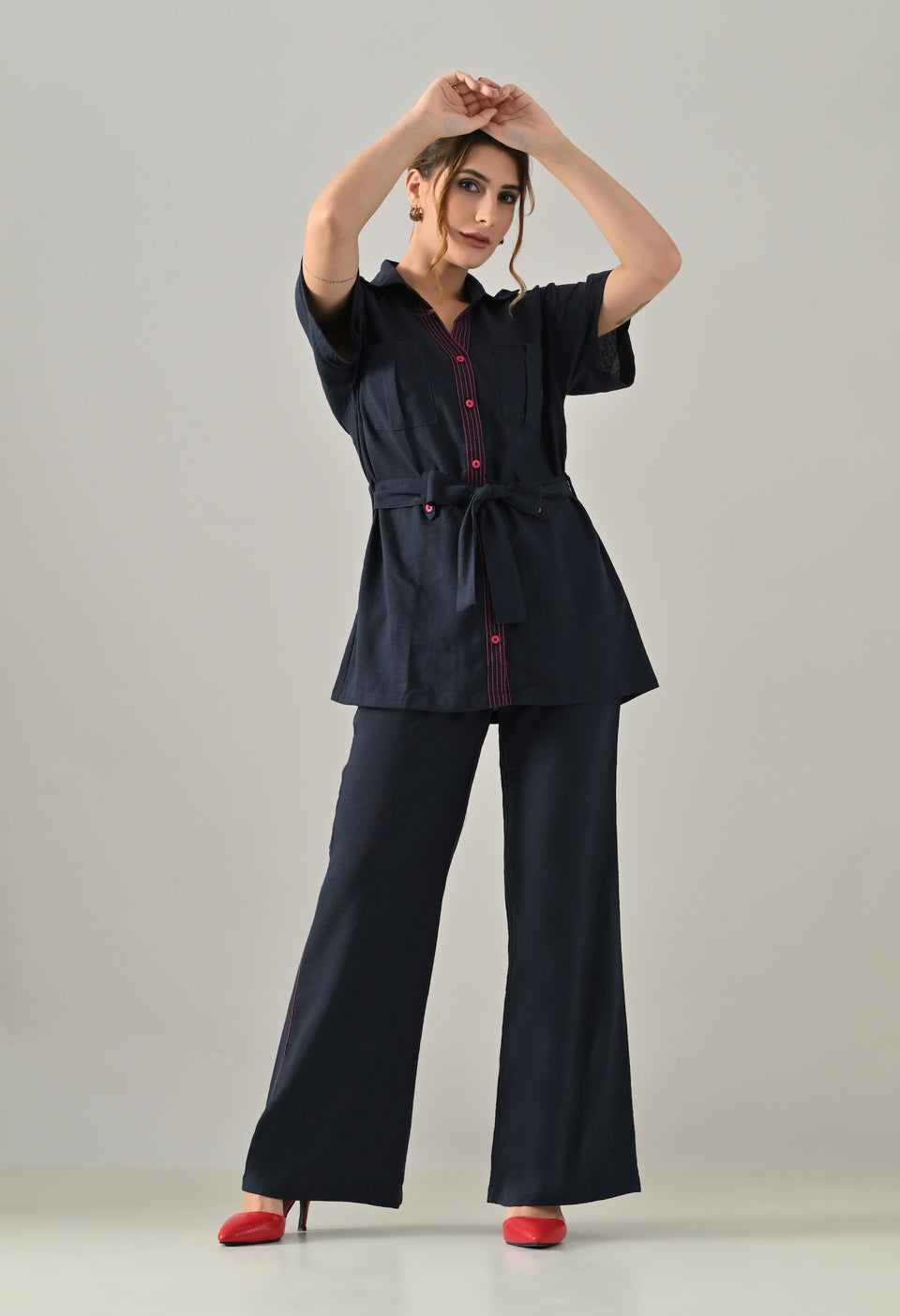 Blue Co-ord set with pink highlights, belt and flared trousers