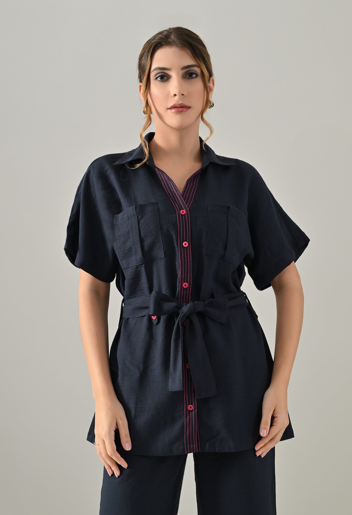 Blue Co-ord set with pink highlights, belt and flared trousers