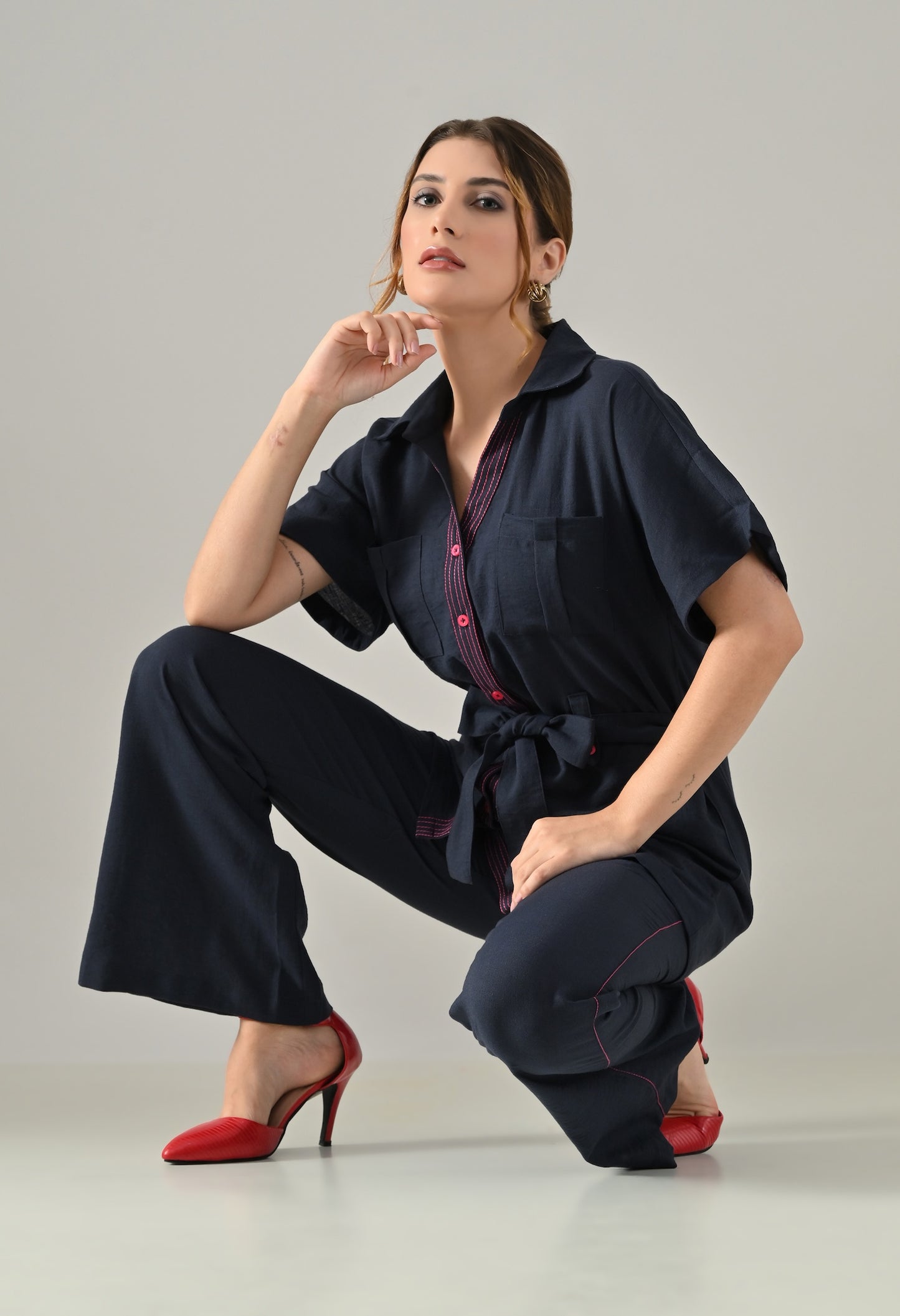 Blue Co-ord set with pink highlights, belt and flared trousers