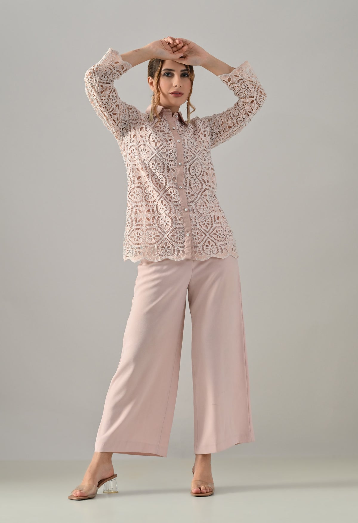 Peach lace cutwork top with flared pants