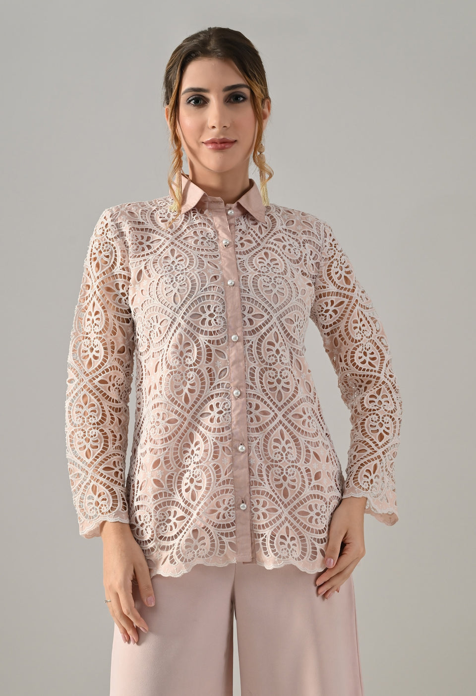 Peach lace cutwork top with flared pants