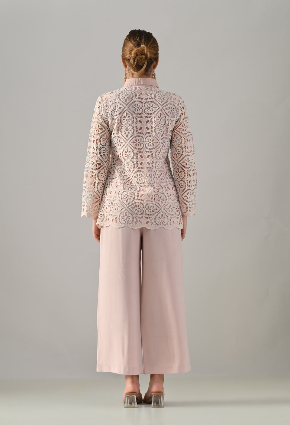 Peach lace cutwork top with flared pants