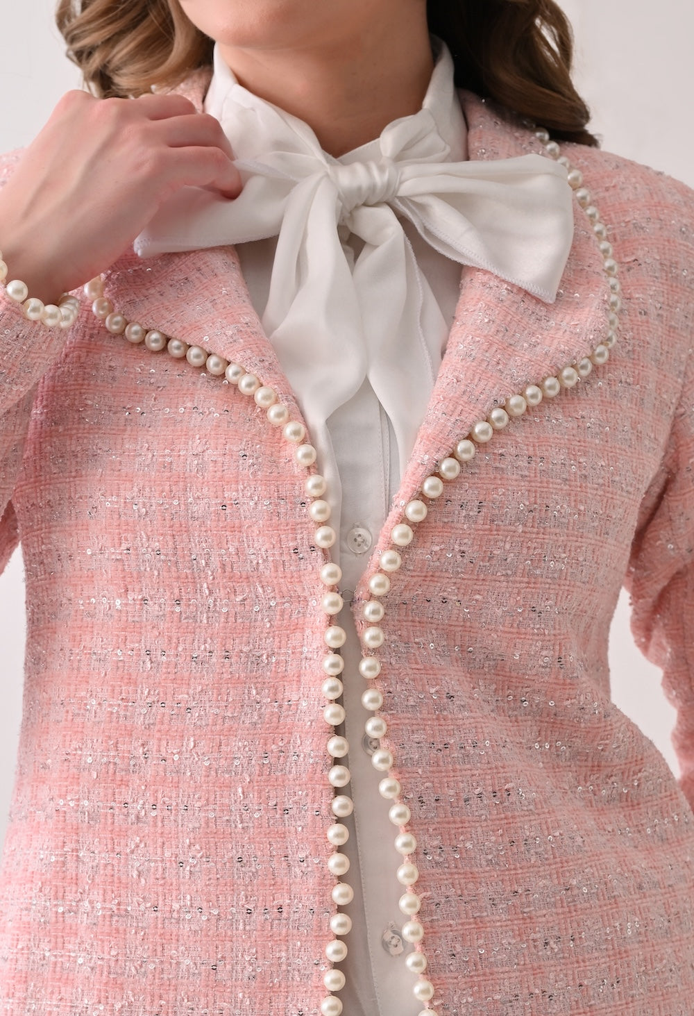 Pink tweed jacket with pearl trim