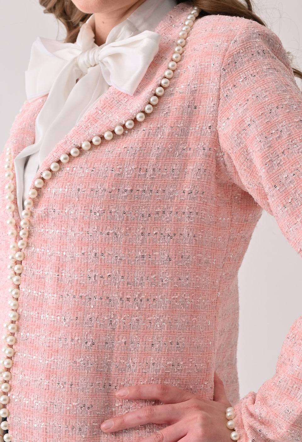 Pink tweed jacket with pearl trim