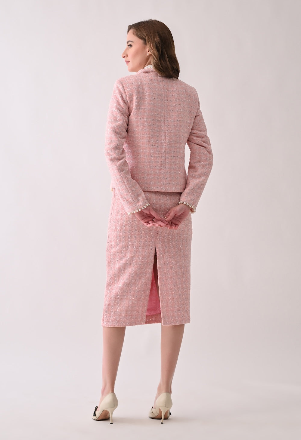 Pink tweed jacket with pearl trim and skirt set