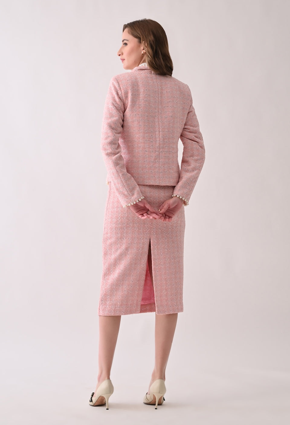 Pink tweed jacket with pearl trim and skirt set