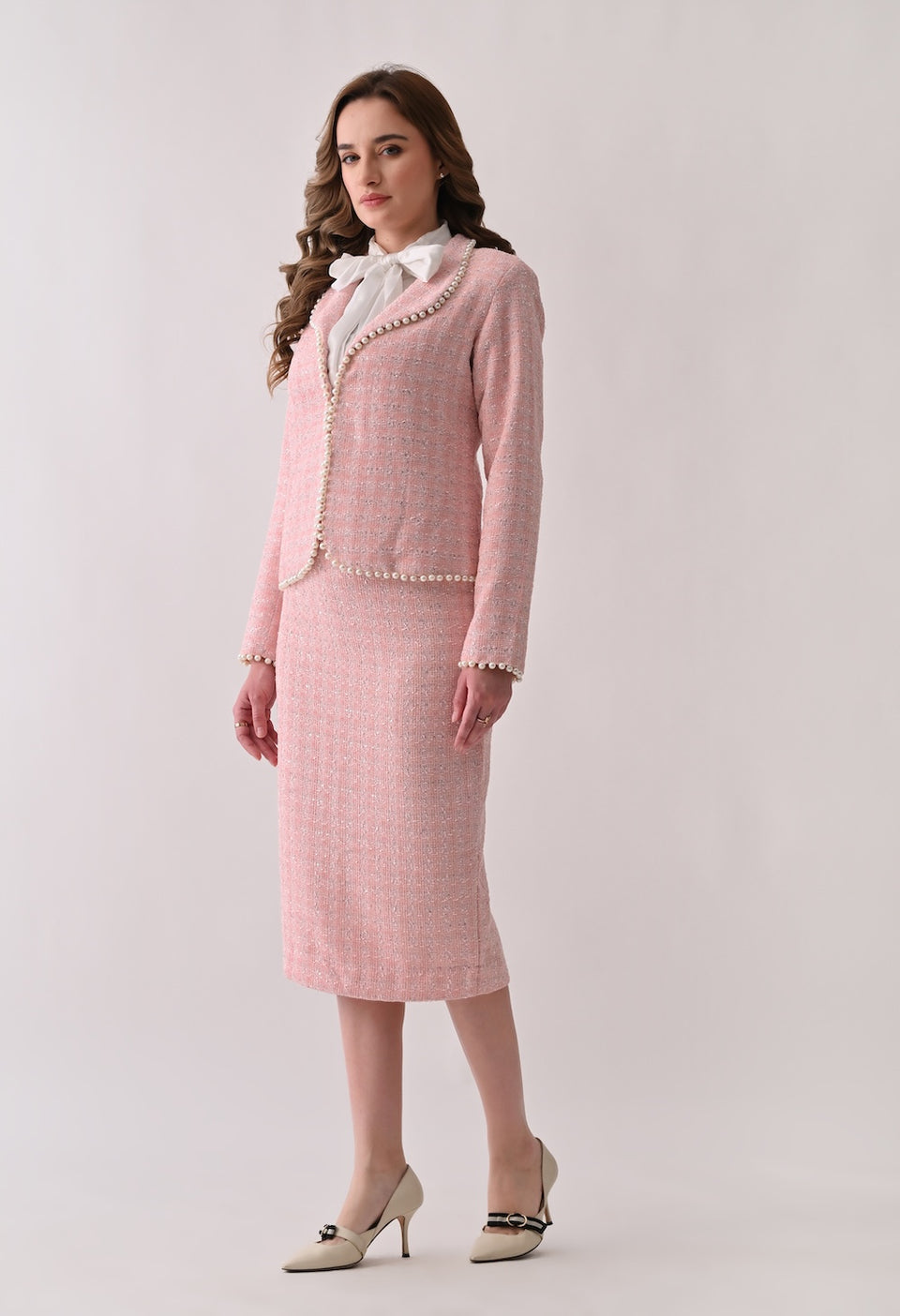 Pink tweed jacket with pearl trim and skirt set