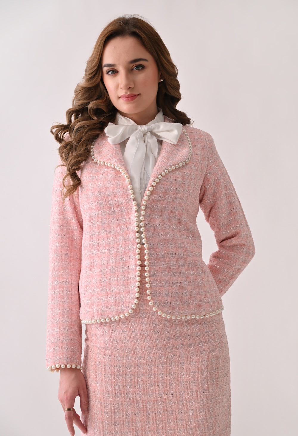 Pink tweed jacket with pearl trim and skirt set
