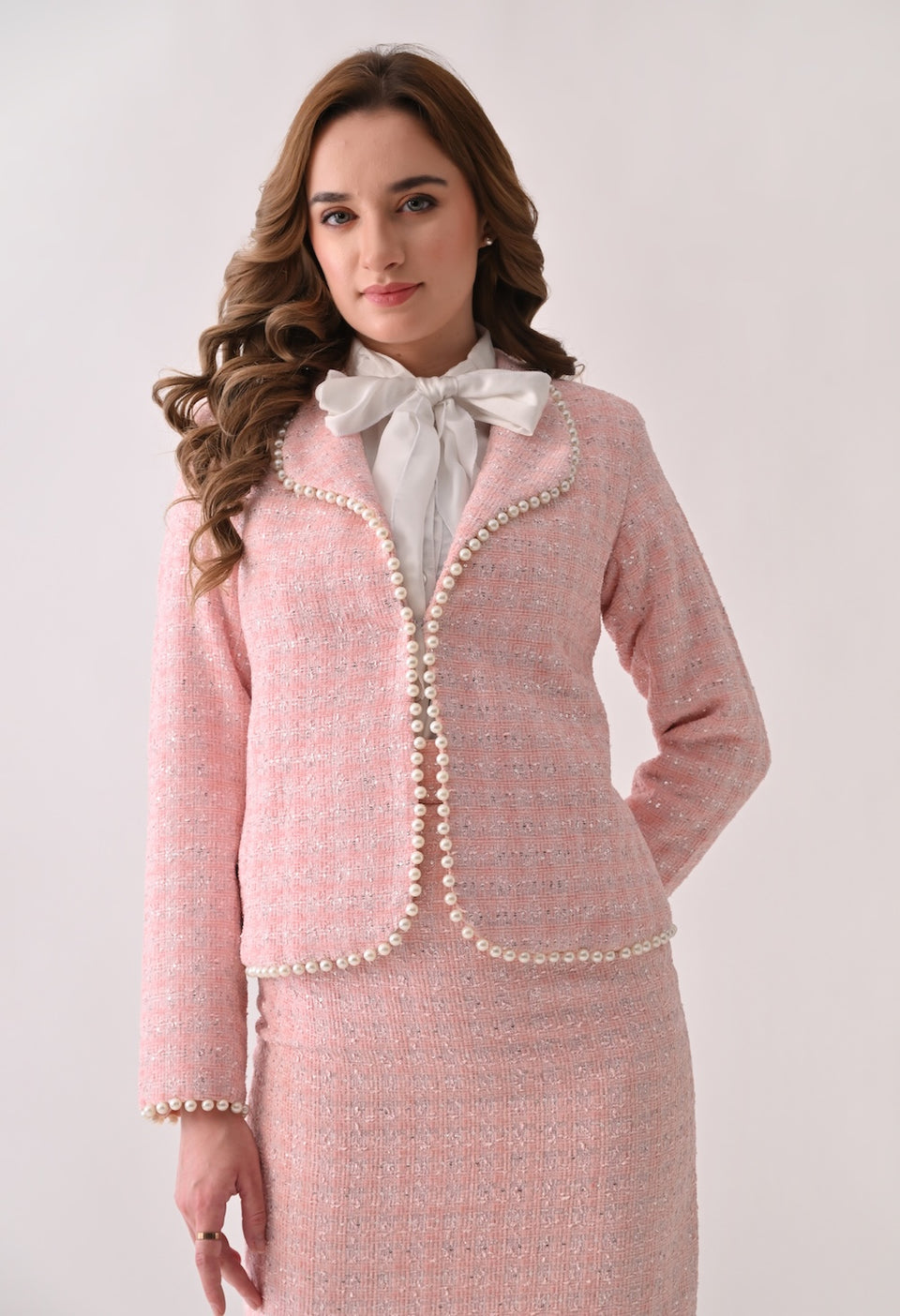 Pink tweed jacket with pearl trim and skirt set