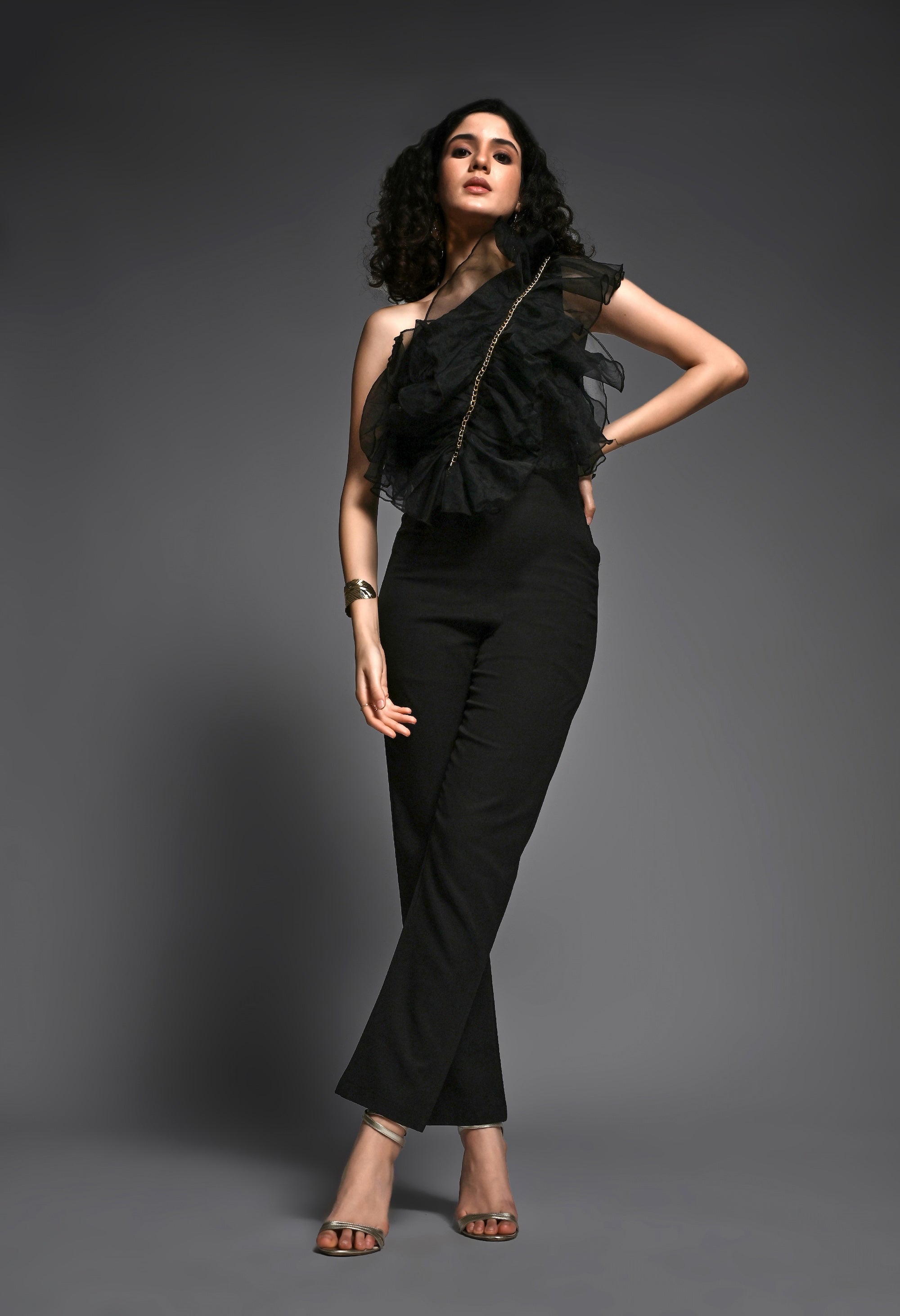 Black jumpsuit with organza frill detailing