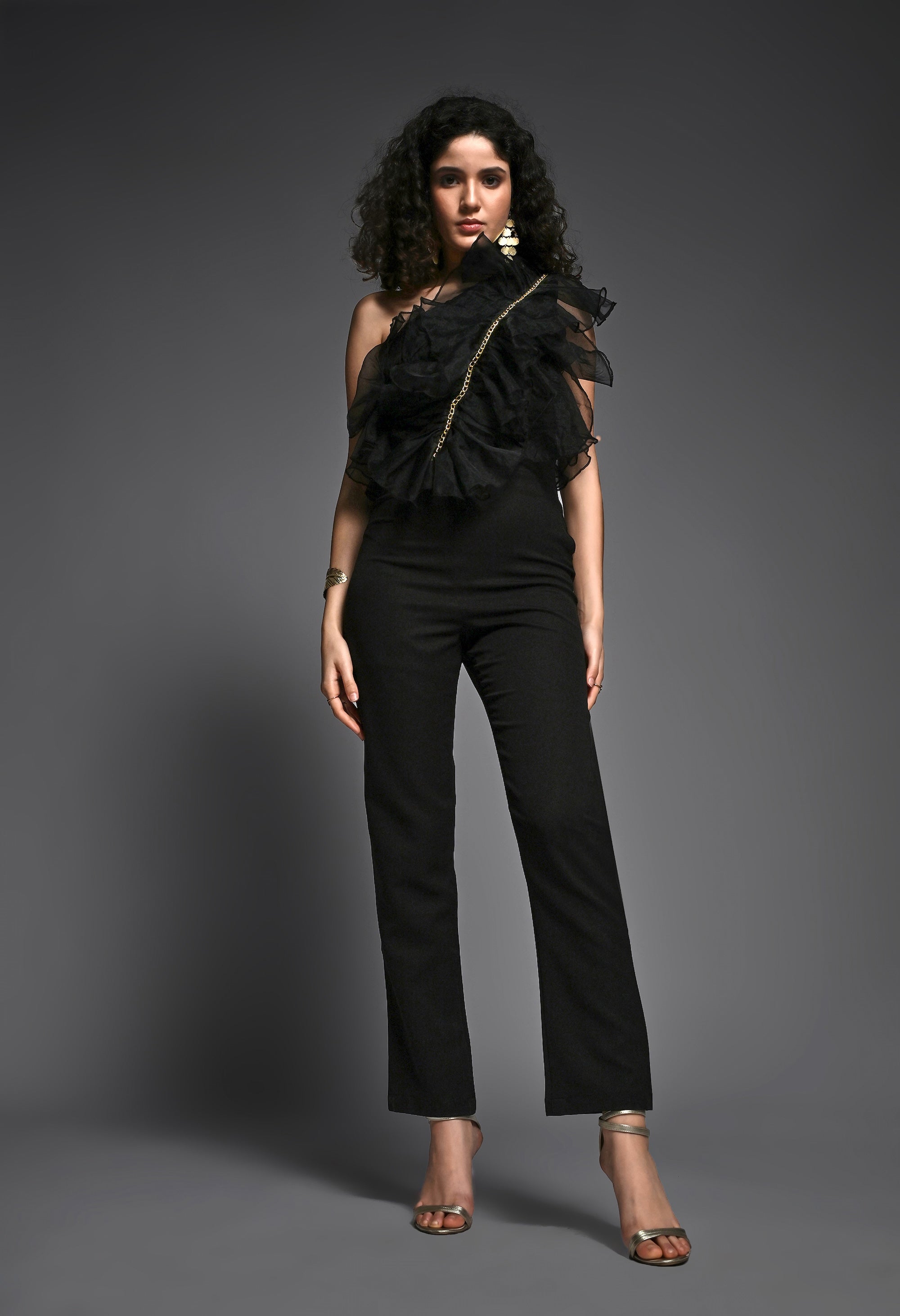 Black jumpsuit with organza frill detailing
