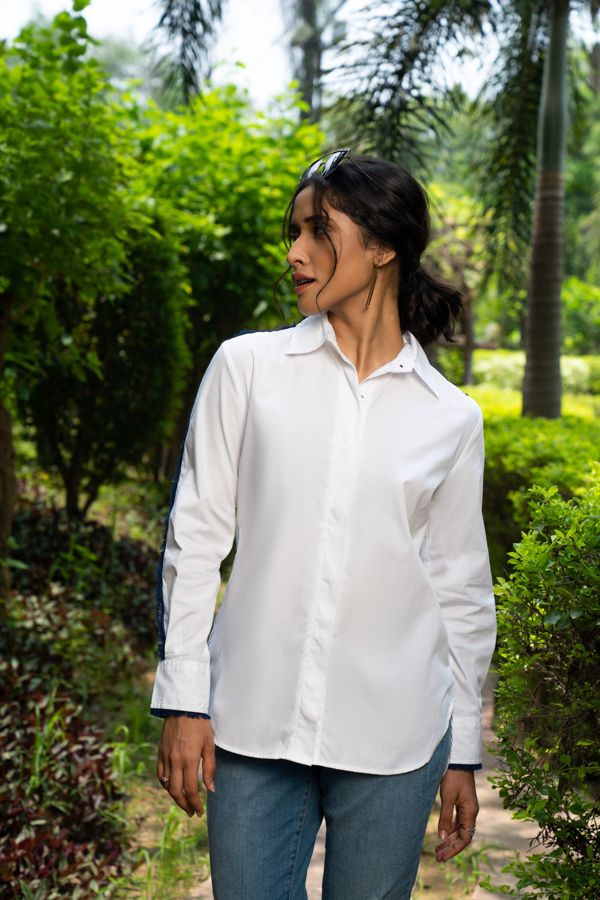 White shirt with denim fringes on sleeves